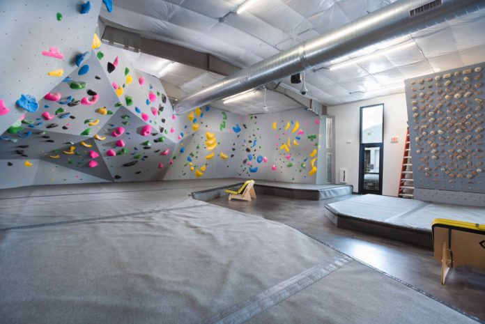 The bouldering area of Climb Iowa East Village, one of the 34 new climbing gyms to open in the US in 2019, and one built with confidence