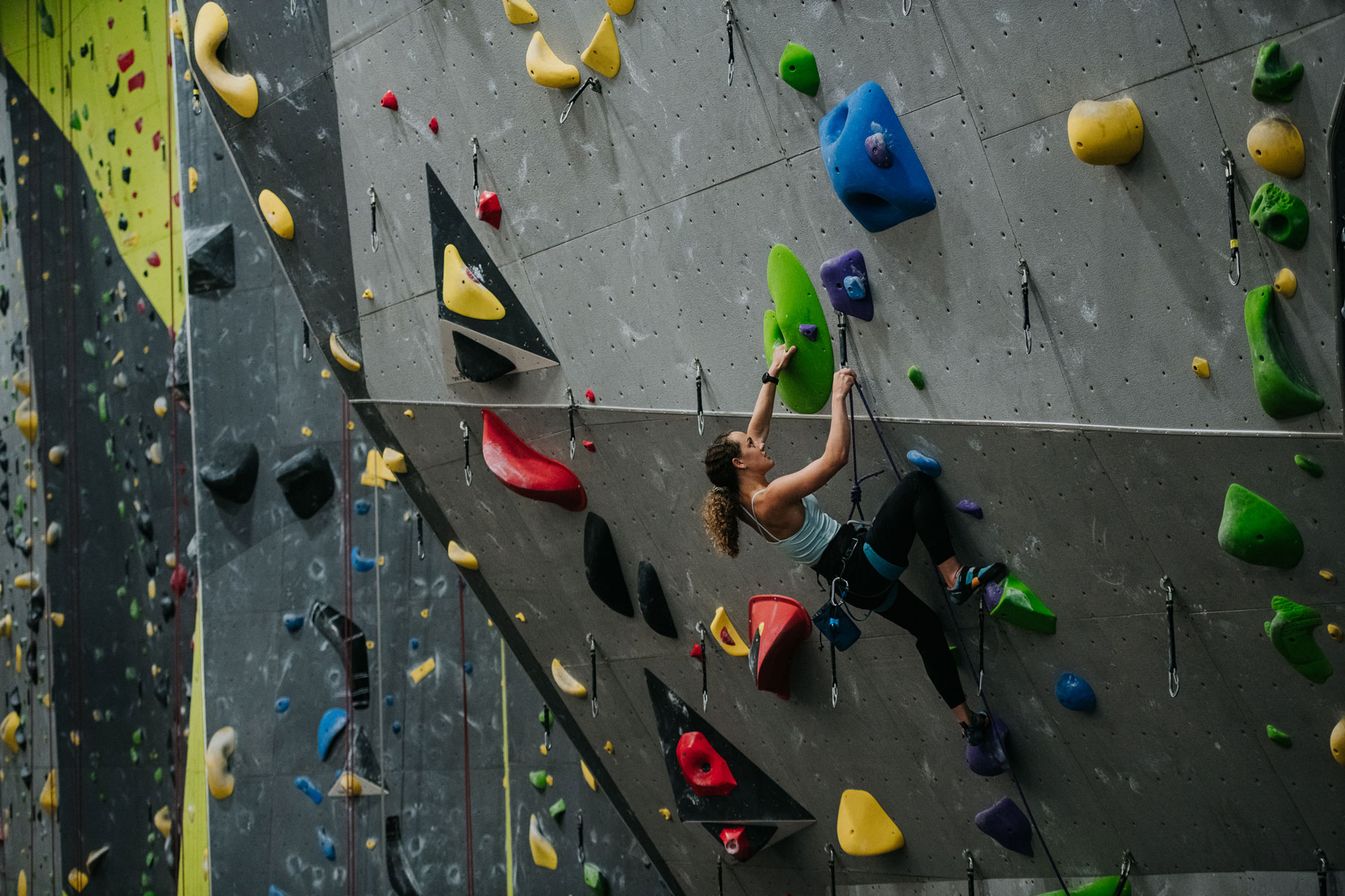 Climbing in the gym, photo by Tara Shupe Photography
