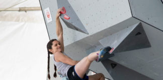 Kyra Condie bouldering in competition