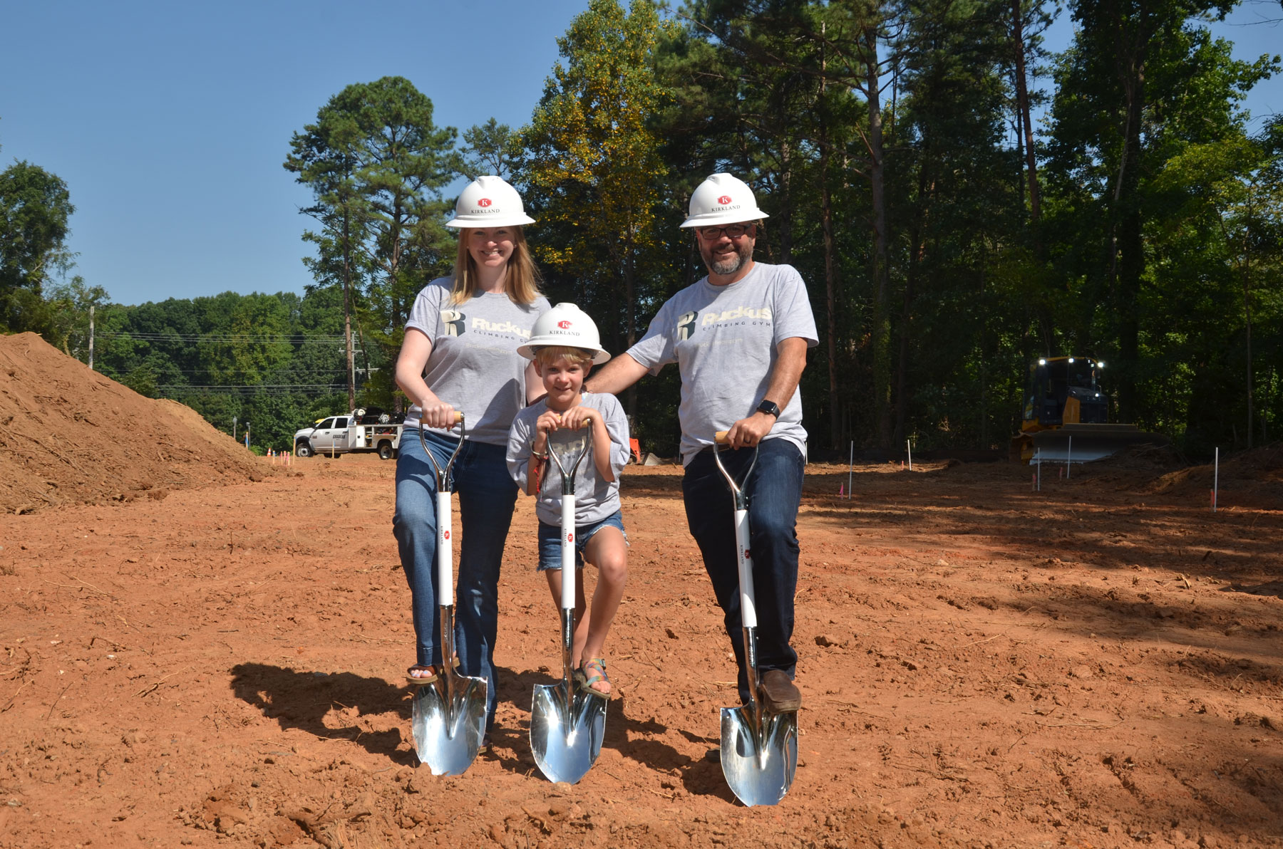 Ruckus Climbing Gym owners and daughter at the ground breaking