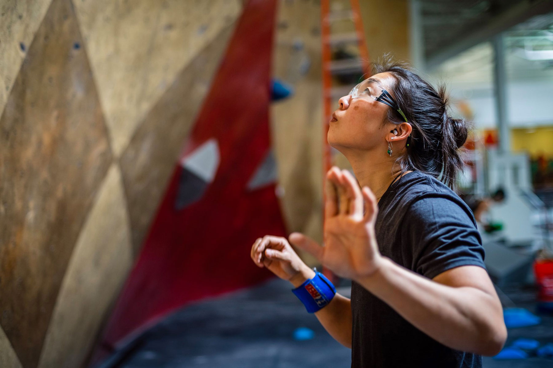 Sydney McNair setting at the IMPACT Climbing Comp in 2020