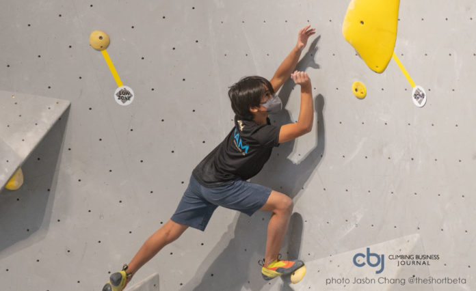 youth climber in comp