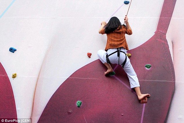 Chinese Climbers Scale Giant Bra - Climbing Business Journal
