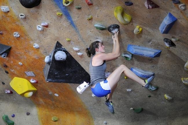 Francesca Metcalf, 22, of Newton climbs on a bouldering wall at Central Rock Gym in Watertown on Monday, July 27, 2015. (Wicked Local Staff Photo/Brett Crawford)